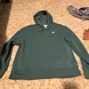 Green, happy face hoodie super soft